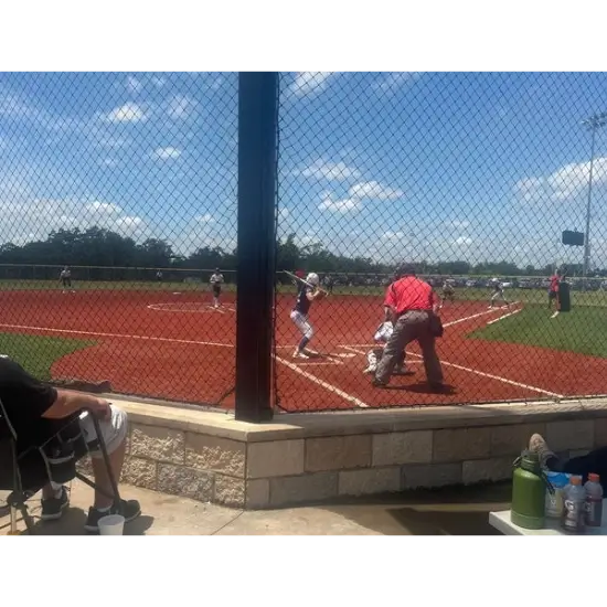 Youth baseball game on sunny day at bouse sports complex in choctaw, ok