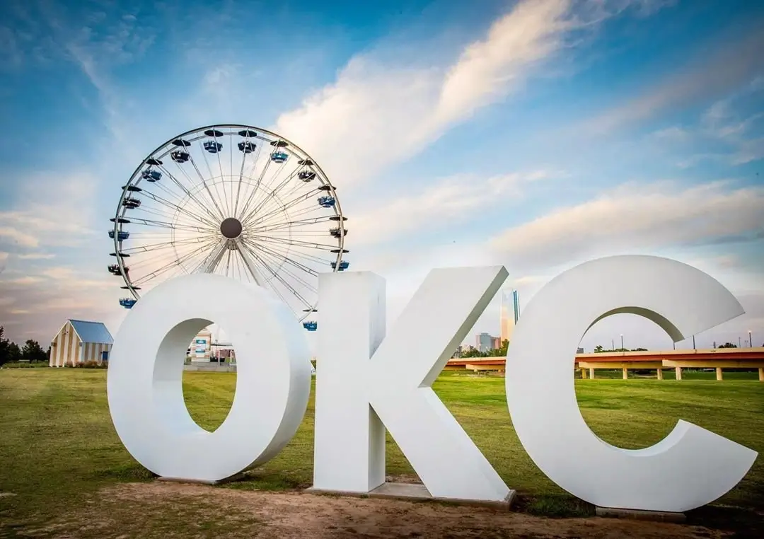 OKC sign with ferris wheel background at Wheeler Park, Oklahoma City.