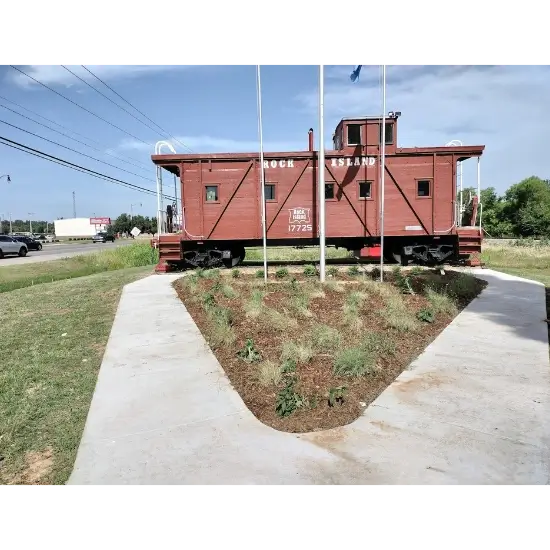 Historic Rock Island red train caboose on display in choctaw, ok.