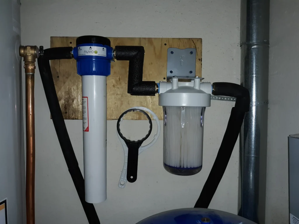Home water filtration system installation on wall