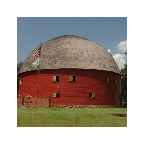 Historic round red barn with American flag in arcadia, ok. photo by fred w marvel